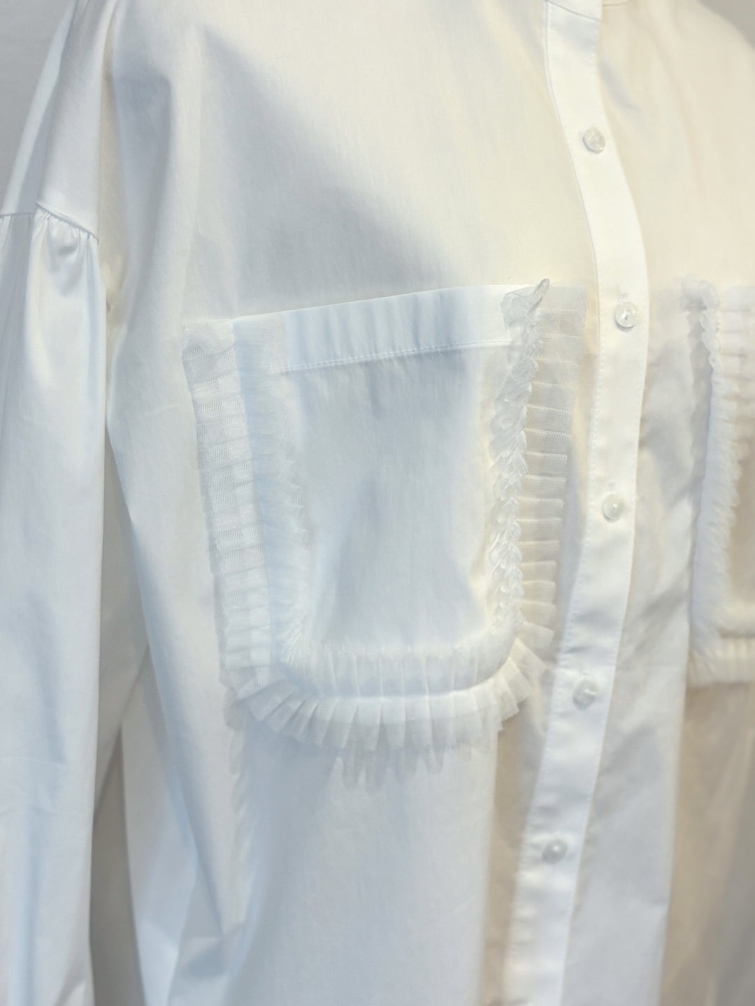 ポケットフリルデザイン大人可愛いブラウス